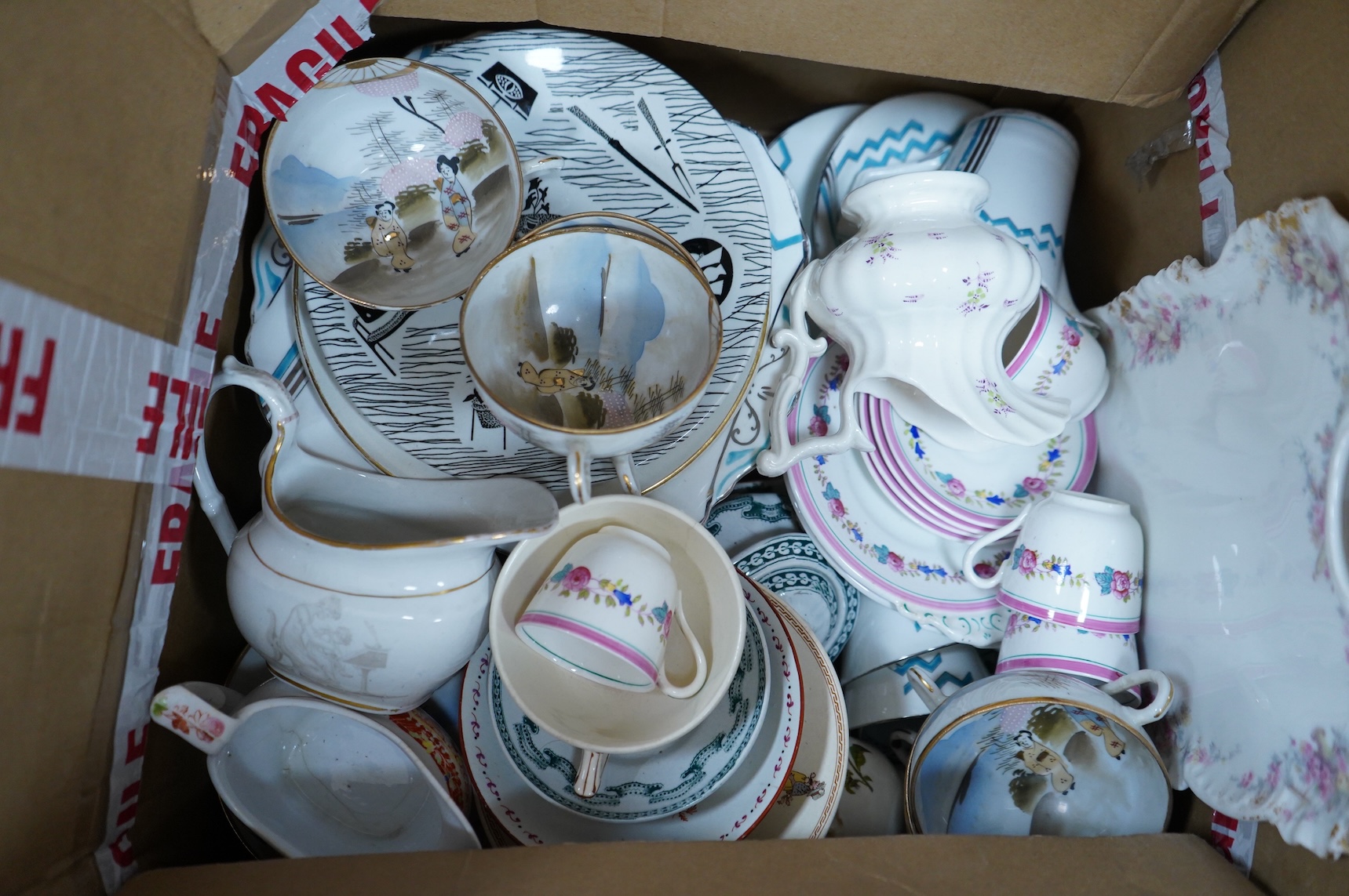 A large collection of various ceramics to include a Ridgways Homemaker plate, Japanese tea set and stoneware jugs